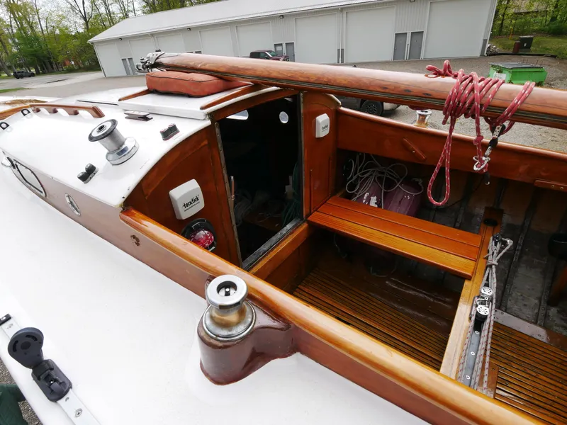 Slide: The Image of 1935 Custom 44' 30-Square Meter Sailing Yacht cockpit with wooden details and winches. - 24
