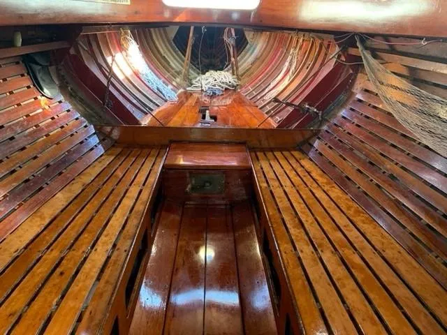 Slide: The Image of Interior of a 1935 Custom 44' 30-Square Meter Sailing Yacht with wooden planks. - 40