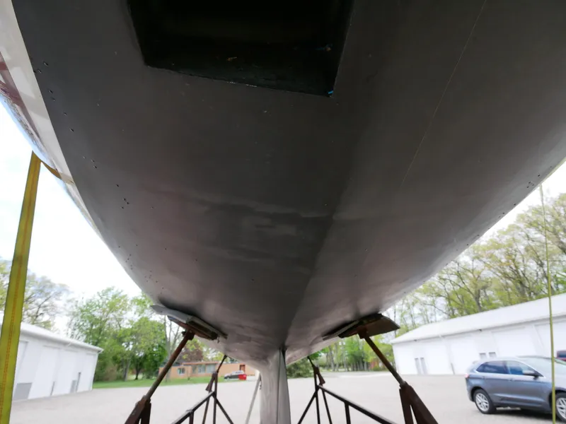 Slide: The Image of Underside view of a 1935 Custom 44' 30-Square Meter Sailing Yacht on stands. - 7