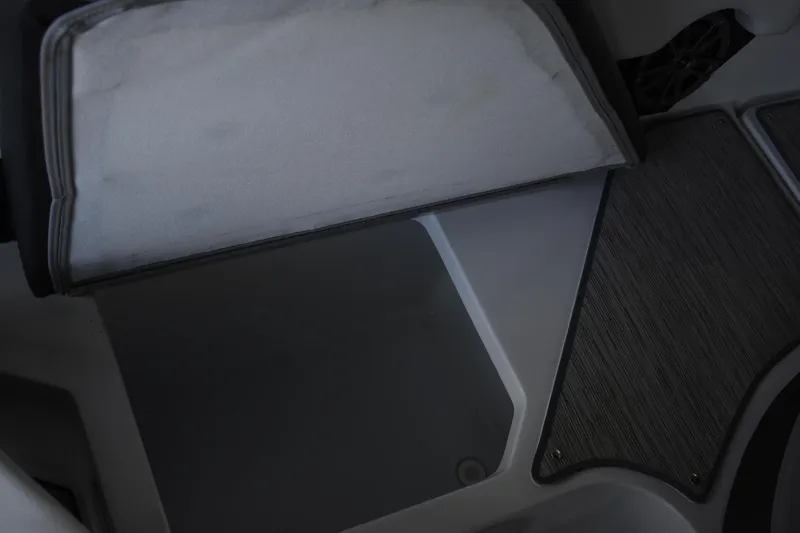 Slide: The Image of 2023 Cobalt CS22 storage compartment with open lid. - 7