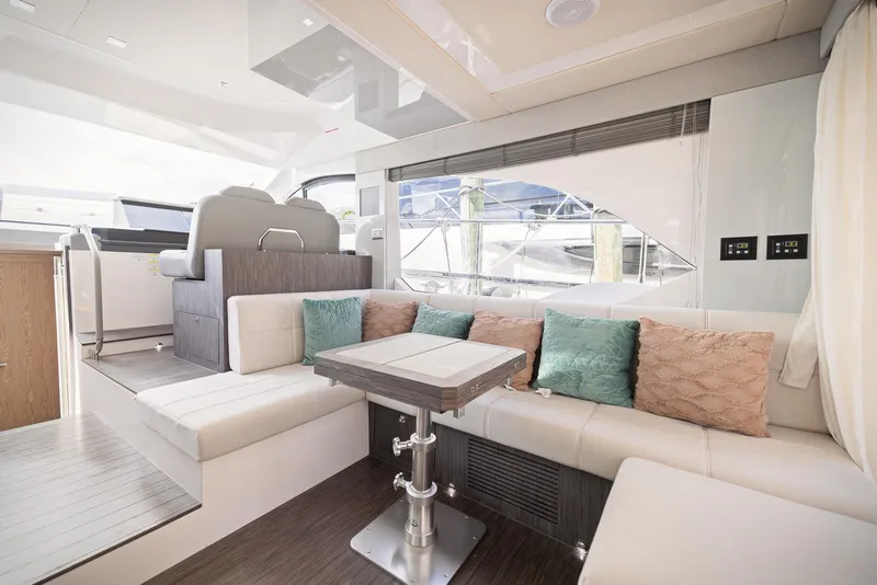Slide: The Image of Luxurious interior of 2024 Sessa Marine Fly 48 yacht with elegant seating and modern design. - 11