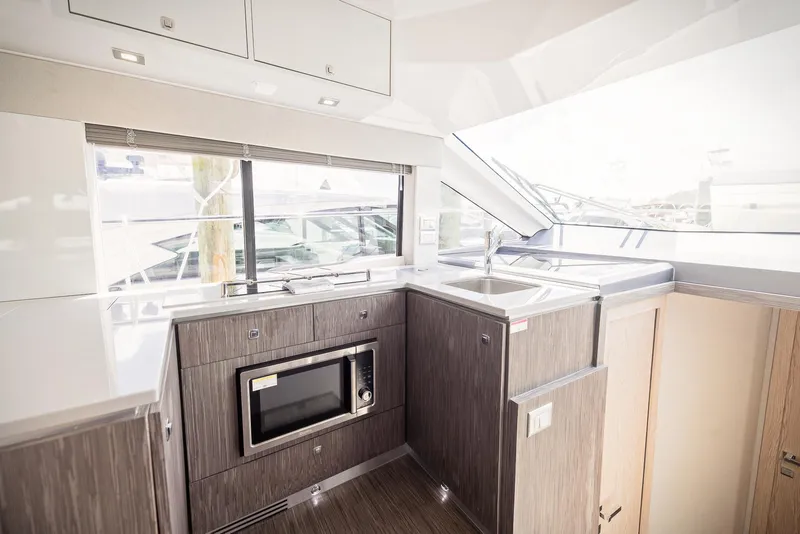 Slide: The Image of Modern kitchen interior of 2024 Sessa Marine Fly 48 yacht. - 13