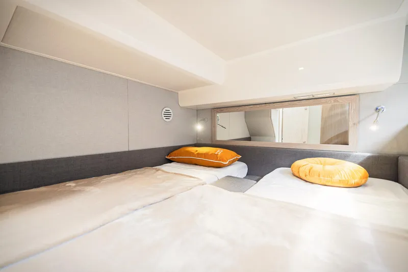 Slide: The Image of Luxurious cabin interior of 2024 Sessa Marine Fly 48 yacht with cozy bedding. - 6