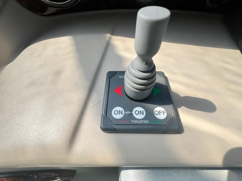 Slide: The Image of Joystick control panel on 2003 Sea Ray 300 Sundancer boat. - 14