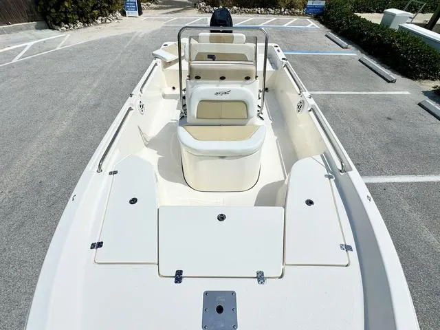 Slide: The Image of 2024 Bulls Bay 2000 boat, spacious interior, parked in a lot, ready for adventure. - 12