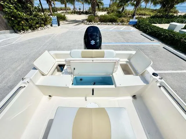 Slide: The Image of 2024 Bulls Bay 2000 boat on trailer in marina. - 6