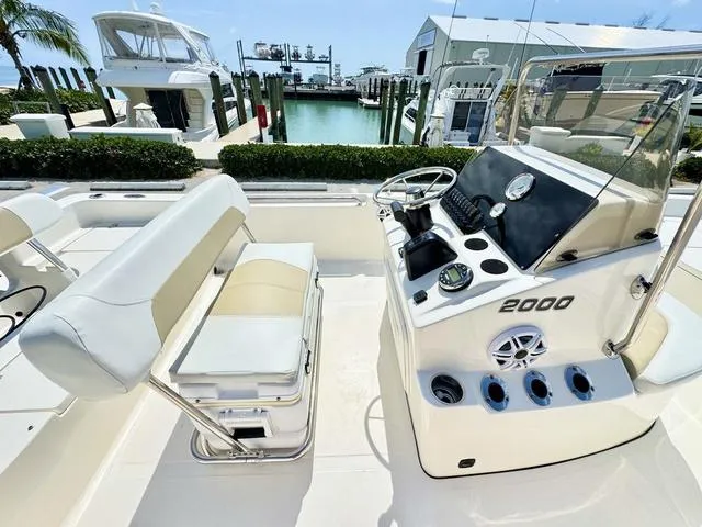 Slide: The Image of 2024 Bulls Bay 2000 boat with Suzuki outboard motor on a trailer. - 8