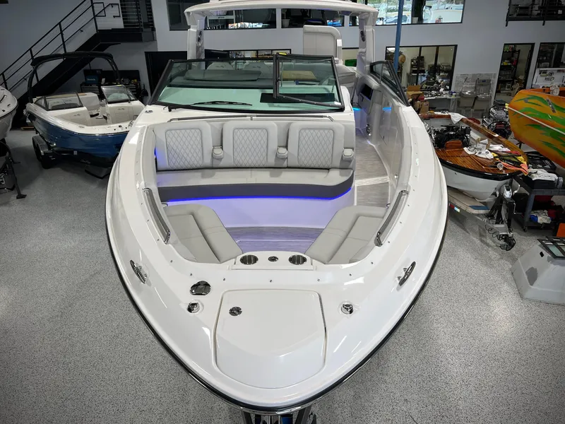 Slide: The Image of 2024 Sea Ray SLX 400 boat interior with luxurious seating and modern design. - 2