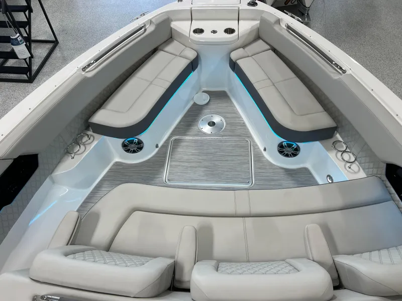 Slide: The Image of 2024 Sea Ray SLX 400 boat interior with luxurious seating and modern design. - 31