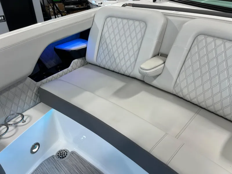 Slide: The Image of 2024 Sea Ray SLX 400 interior with luxurious seating and modern design. - 37