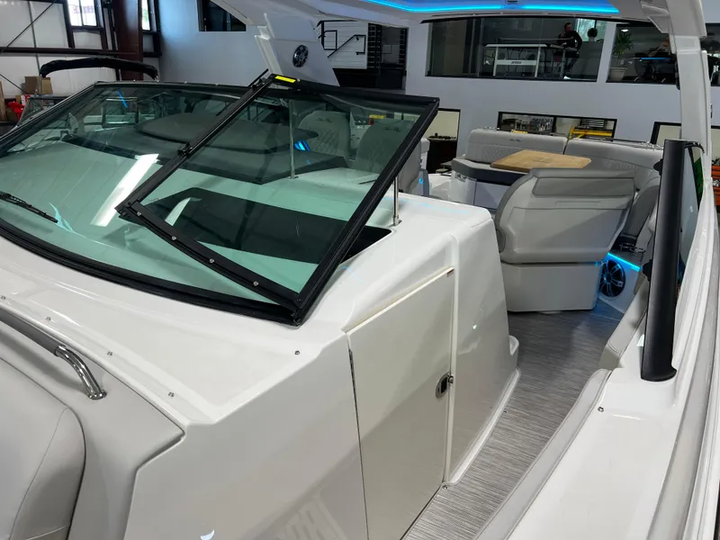 Slide: The Image of 2024 Sea Ray SLX 400 boat interior with modern seating and sleek design. - 43