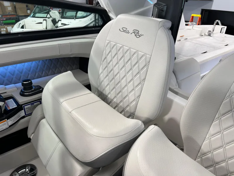 Slide: The Image of 2024 Sea Ray SLX 400 luxury boat seat with quilted design and logo embroidery. - 46