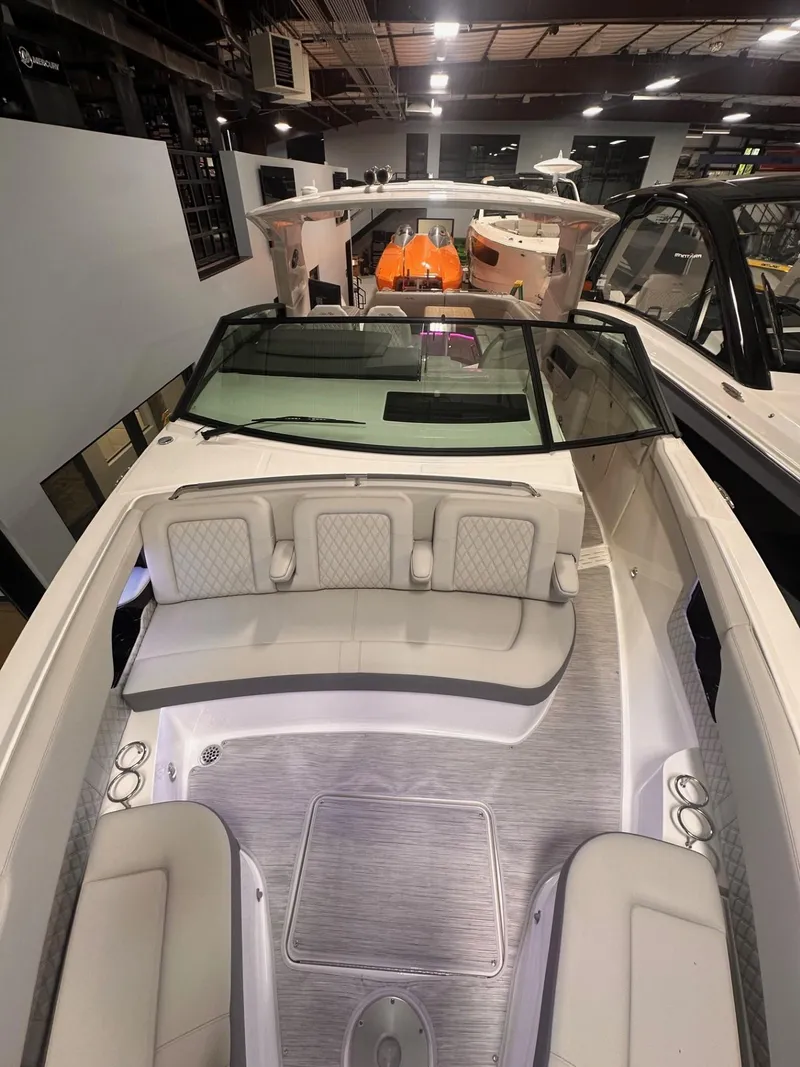 Slide: The Image of 2024 Sea Ray SLX 400 luxury boat interior with spacious seating and modern design. - 64