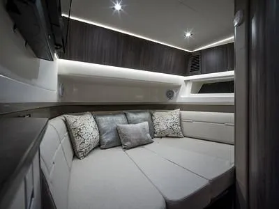 Slide: The Image of Luxurious interior cabin of 2024 Sea Ray SLX 400 yacht with modern decor. - 84
