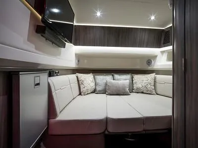 Slide: The Image of Luxurious interior cabin of 2024 Sea Ray SLX 400 with modern amenities and comfortable seating. - 86