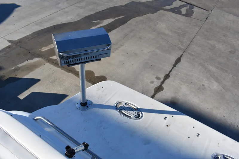 Slide: The Image of Alt text: 2003 Bayliner 305 boat with mounted grill on deck. - 38