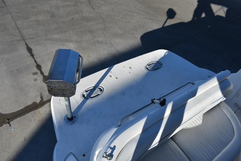 Slide: The Image of 2003 Bayliner 305 boat deck with seating and stainless steel hardware. - 39