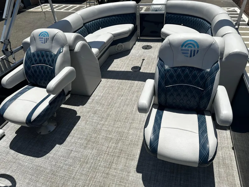 Slide: The Image of 2022 Nepallo CW24-ST24QL pontoon boat interior with plush seating and modern design. - 12
