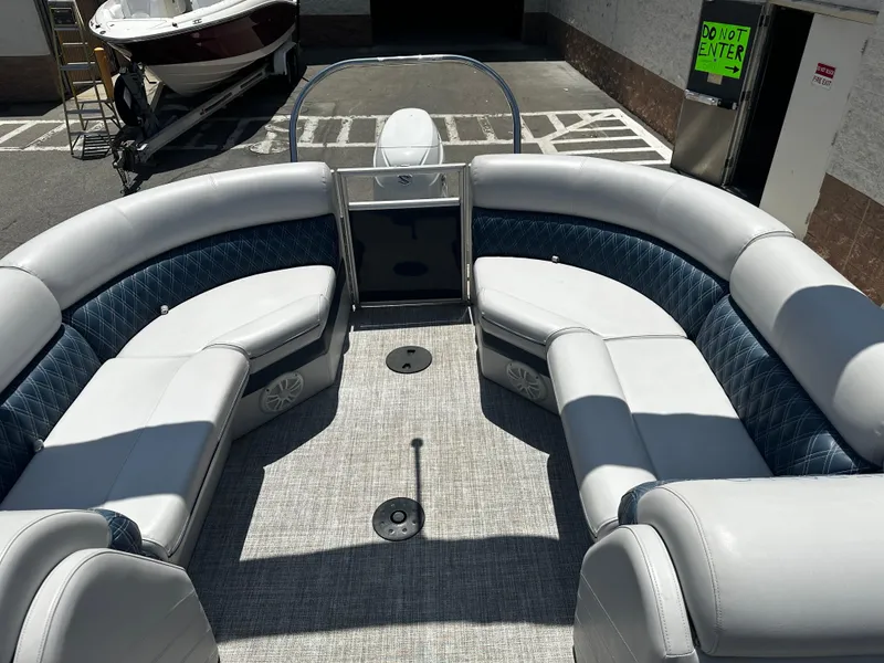 Slide: The Image of 2022 Nepallo CW24-ST24QL pontoon boat with spacious seating and modern design. - 13