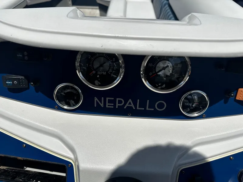 Slide: The Image of Dashboard of a 2022 Nepallo CW24-ST24QL boat with gauges and controls. - 17