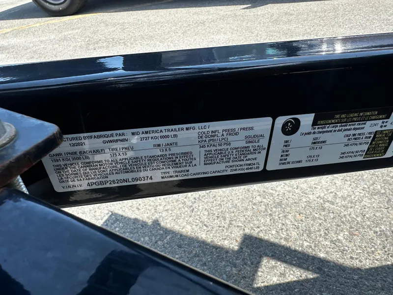 Slide: The Image of Close-up of Nepallo CW24-ST24QL 2022 trailer label with specifications. - 18