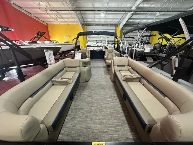 Slide: The Image of 2024 Godfrey Sweetwater 2286 SB GTP pontoon boat interior in showroom. - 6