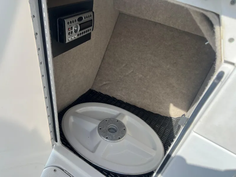 Slide: The Image of Storage compartment in a 2006 Formula 240 Bowrider boat. - 19