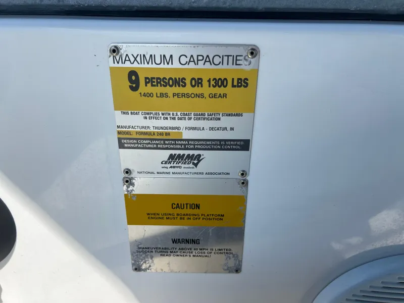 Slide: The Image of 2006 Formula 240 Bowrider capacity plate: 9 persons or 1300 lbs, 1400 lbs with gear. - 26