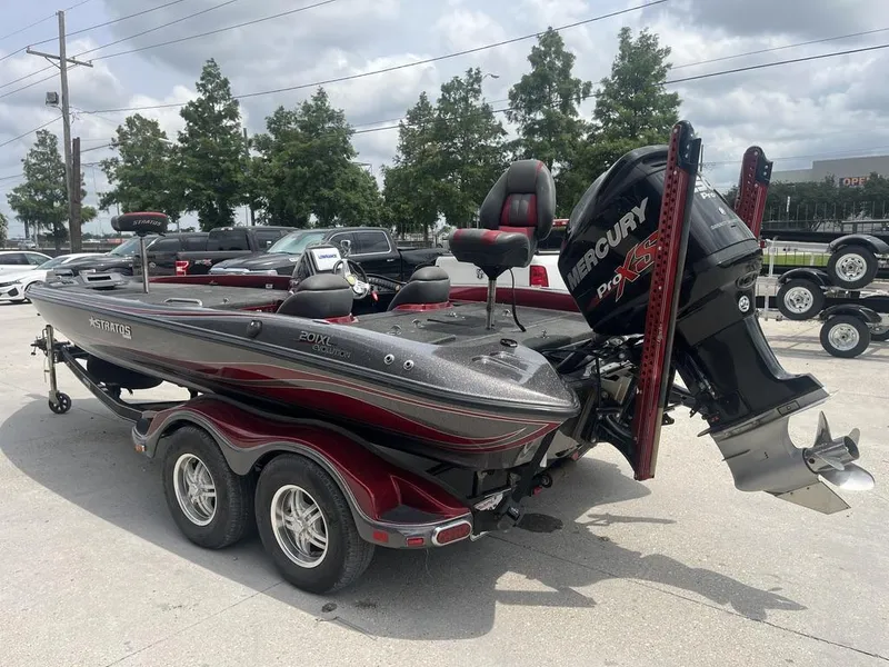 Slide: The Image of 2016 Stratos 201 XL Evolution boat with Mercury Pro XS engine on trailer. - 11
