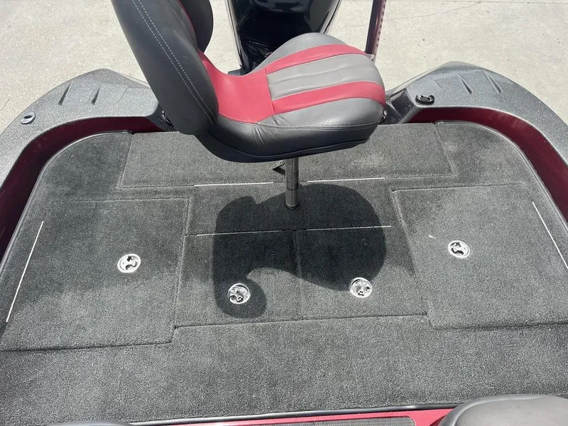 Slide: The Image of 2016 Stratos 201 XL Evolution boat deck with a red and black seat. - 17