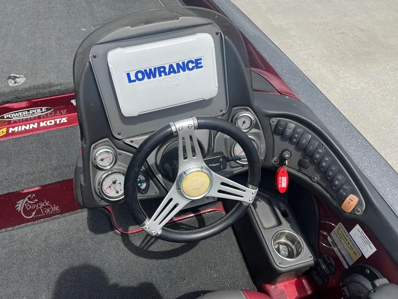 Slide: The Image of 2016 Stratos 201 XL Evolution boat dashboard with Lowrance HDS system and Minn Kota accessories. - 19