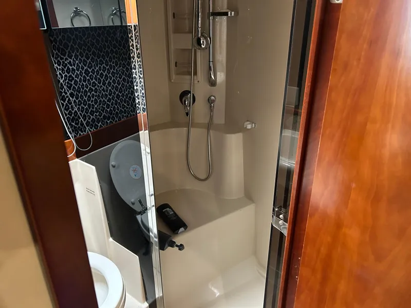 Slide: The Image of Bathroom interior of 2009 Cruisers 390 Sportcoupe yacht with shower and toilet. - 24