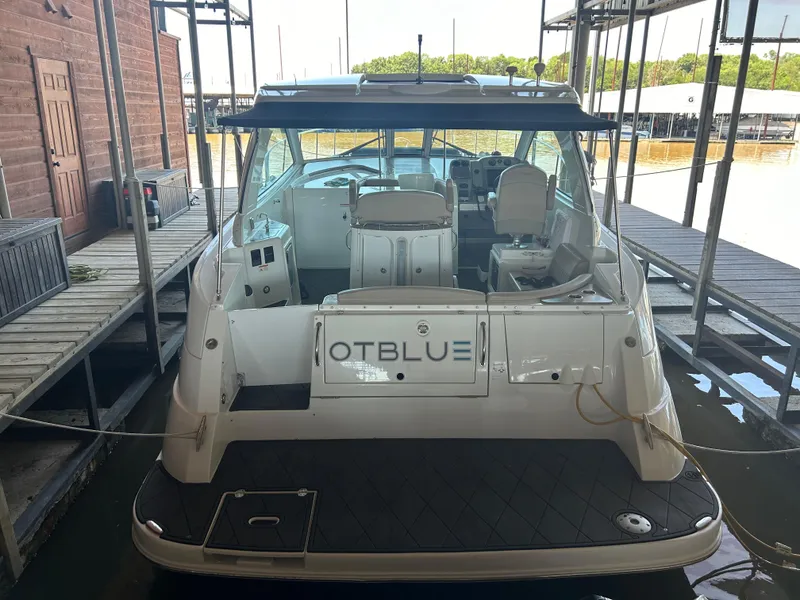 Slide: The Image of 2009 Cruisers 390 Sportcoupe docked at marina, rear view. - 4