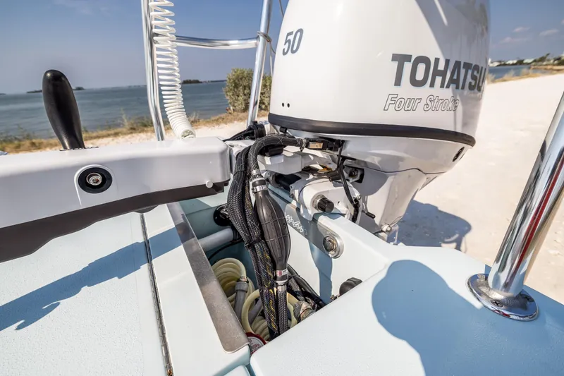 Slide: The Image of 2008 Hell's Bay Waterman 16 with Tohatsu 50 Four Stroke outboard motor. - 11