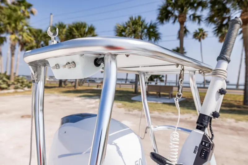 Slide: The Image of Close-up of a 2008 Hell's Bay Waterman 16 boat's console and T-top. - 19
