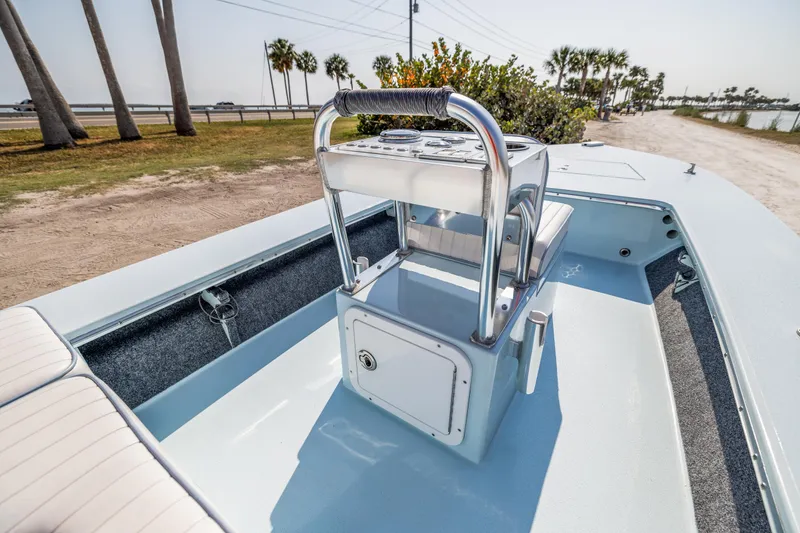 Slide: The Image of 2008 Hell's Bay Waterman 16 boat interior with center console and seating. - 24