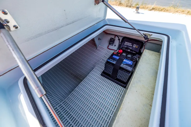 Slide: The Image of Battery compartment of a 2008 Hell's Bay Waterman 16 boat. - 31