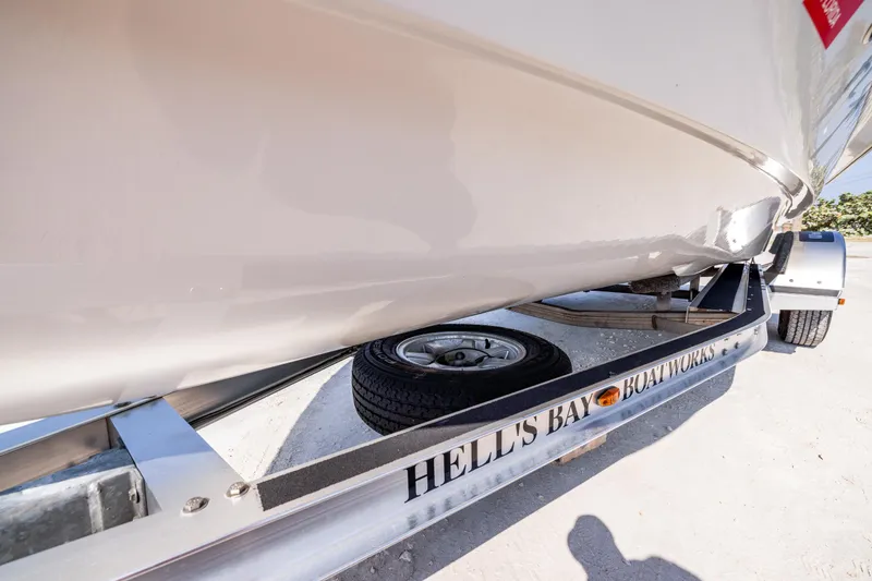 Slide: The Image of 2008 Hell's Bay Waterman 16 boat on trailer, close-up view. - 34