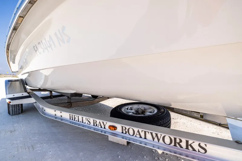 Slide: The Image of 2008 Hell's Bay Waterman 16 boat on trailer, side view. - 35