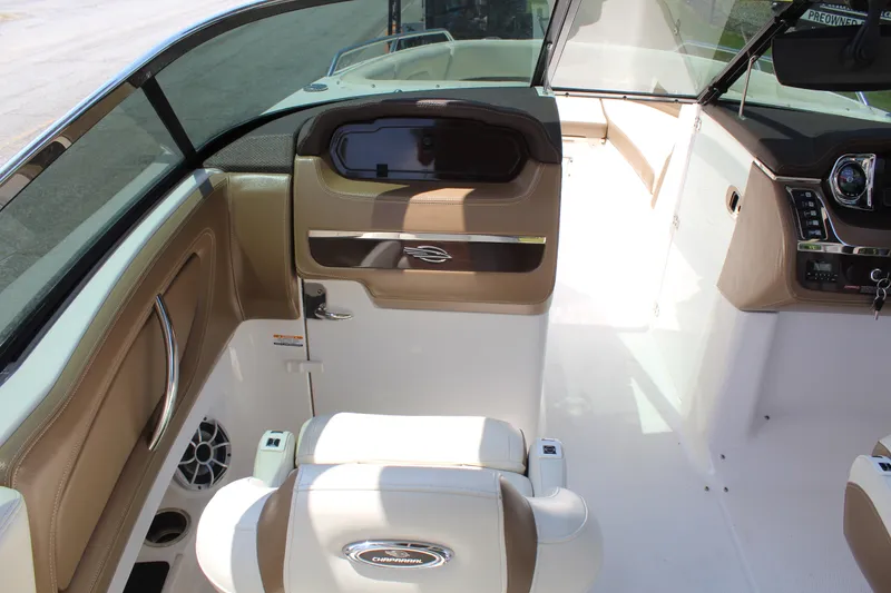 Slide: The Image of Interior of a 2016 Chaparral 257 SSX boat with beige seating. - 14