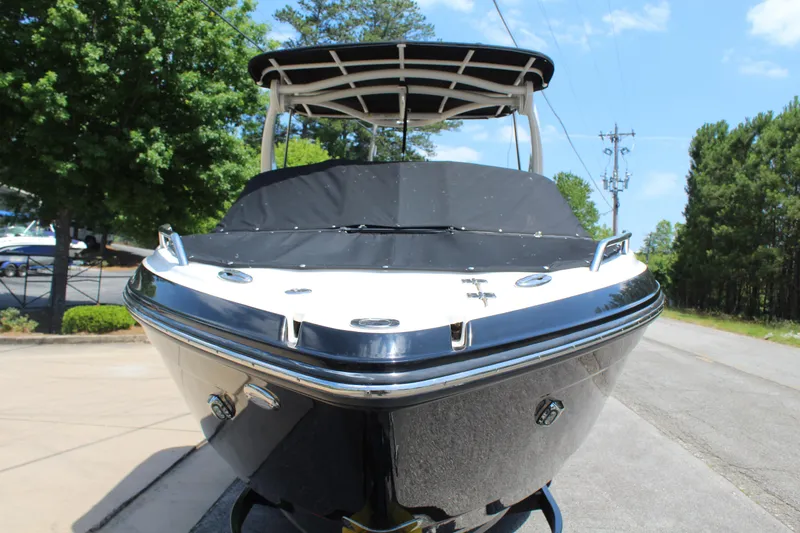 Slide: The Image of 2016 Chaparral 257 SSX boat, front view, black and white, on trailer. - 24