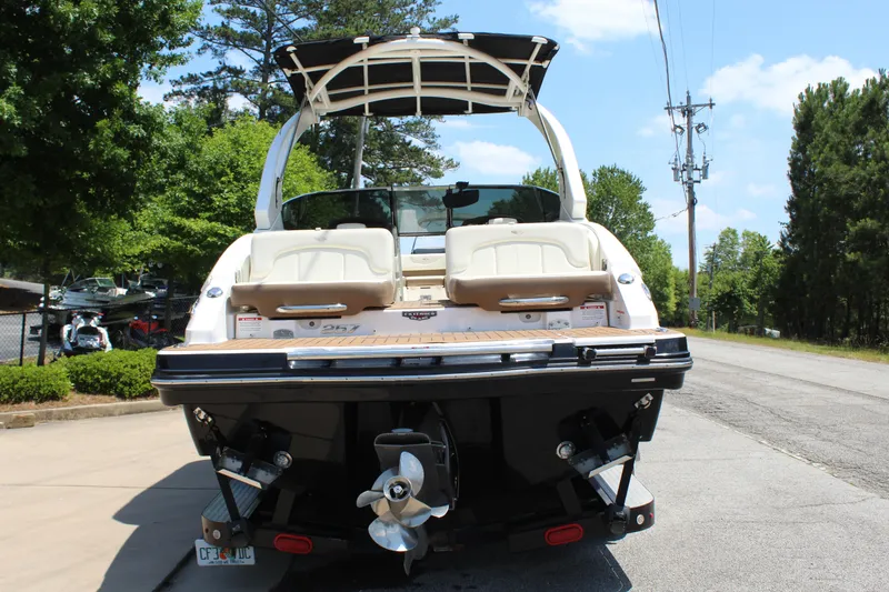Slide: The Image of Rear view of a 2016 Chaparral 257 SSX boat on a trailer. - 5