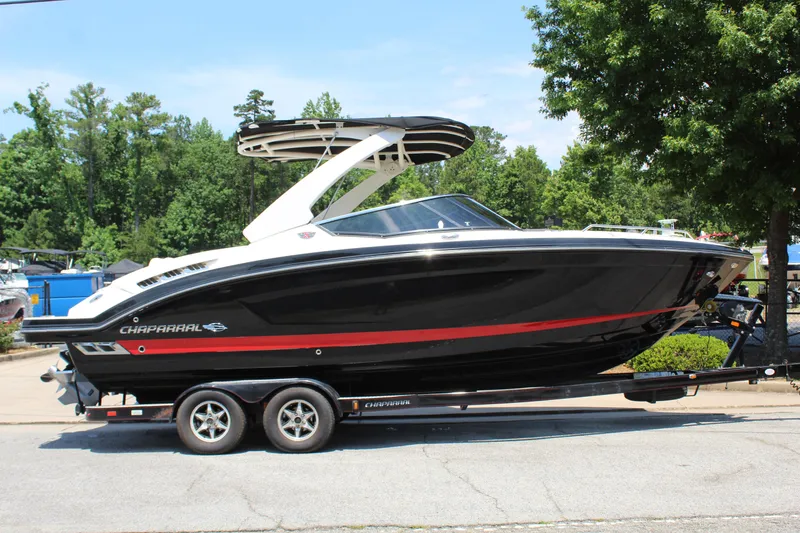 Slide: The Image of 2016 Chaparral 257 SSX boat on trailer outdoors. - 6