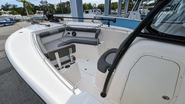 Slide: The Image of 2023 Sea Born SX239 Offshore boat interior with seating and storage. - 15