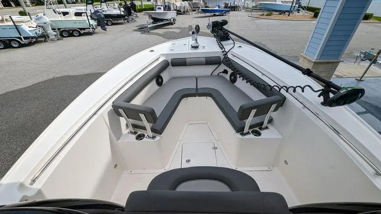 Slide: The Image of 2023 Sea Born SX239 Offshore boat with spacious bow seating and modern amenities. - 17