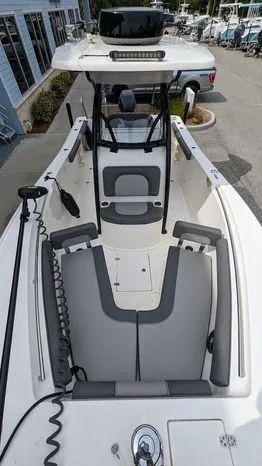 Slide: The Image of 2023 Sea Born SX239 Offshore boat interior with seating and console. - 7