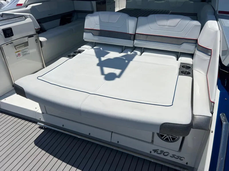 Slide: The Image of 2017 Formula 430 Super Sport Crossover boat with spacious deck and seating area. - 11