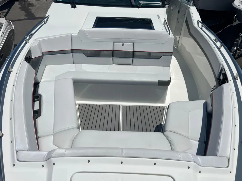 Slide: The Image of 2017 Formula 430 Super Sport Crossover boat deck with seating and speakers. - 19