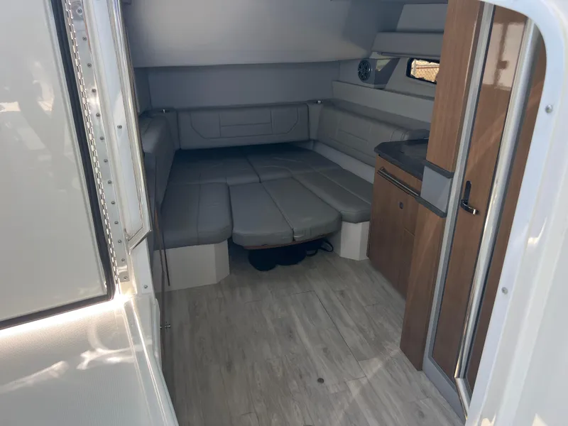 Slide: The Image of 2017 Formula 430 Super Sport Crossover boat interior with sleek kitchenette and modern design. - 26