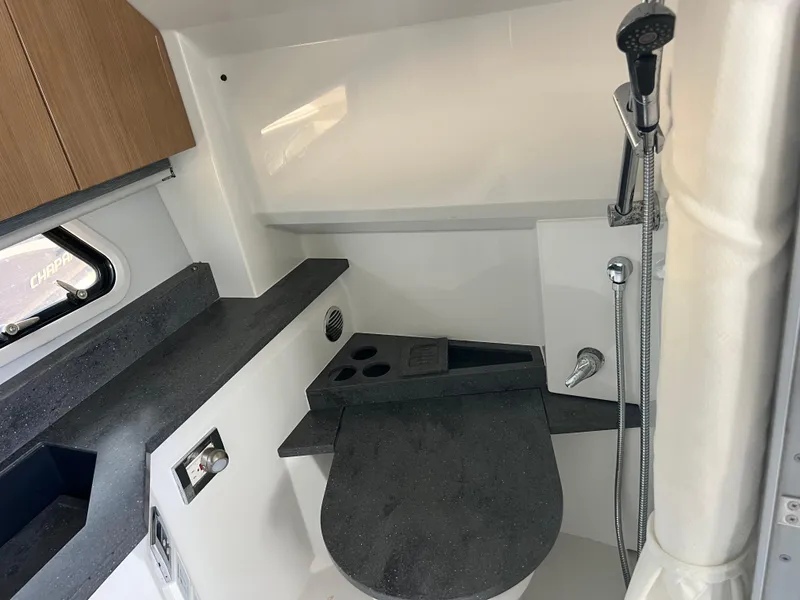 Slide: The Image of 2017 Formula 430 Super Sport Crossover interior with open stainless steel drawer. - 33